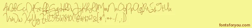 BmdJenniferLynne-Schriftart – Braune Schriften auf gelbem Hintergrund