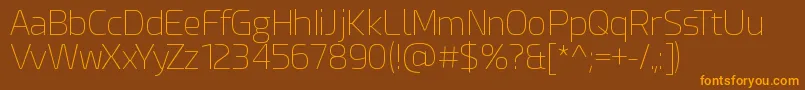 EsphimereThin-Schriftart – Orangefarbene Schriften auf braunem Hintergrund