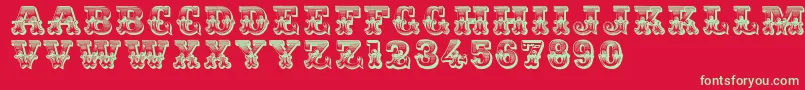 Dsromantiques-Schriftart – Grüne Schriften auf rotem Hintergrund