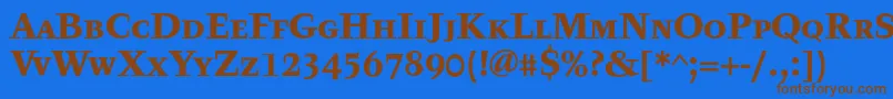 フォントTyfatextcapsBold – 茶色の文字が青い背景にあります。