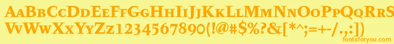 フォントTyfatextcapsBold – オレンジの文字が黄色の背景にあります。