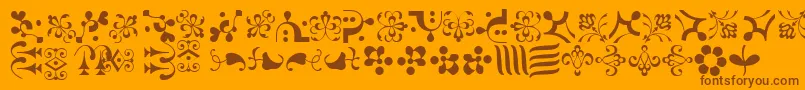 CaravanLhOne-Schriftart – Braune Schriften auf orangefarbenem Hintergrund