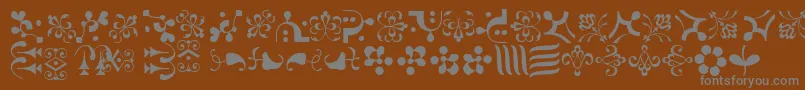 CaravanLhOne Font – Gray Fonts on Brown Background