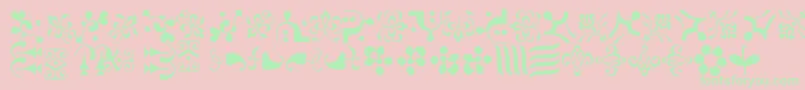 CaravanLhOne-Schriftart – Grüne Schriften auf rosa Hintergrund