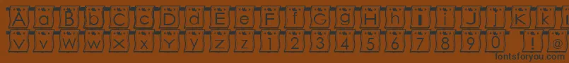 フォントWlFont – 黒い文字が茶色の背景にあります
