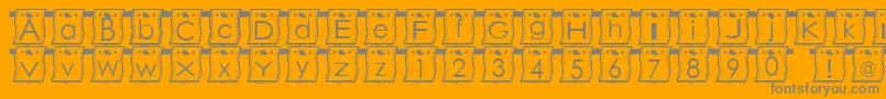 WlFont-fontti – harmaat kirjasimet oranssilla taustalla