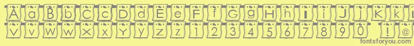 Fonte WlFont – fontes cinzas em um fundo amarelo