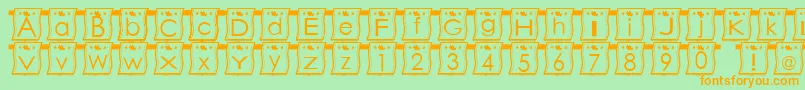フォントWlFont – オレンジの文字が緑の背景にあります。
