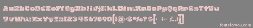 Rhinoinlinegrunge-Schriftart – Rosa Schriften auf grauem Hintergrund