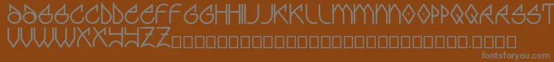 Więcej informacji o czcionce Graff Czcionka Graff – szare czcionki na brązowym tle