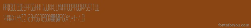 Czcionka DigitalReadoutCondupright – szare czcionki na brązowym tle