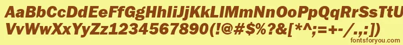 フォントFranklingothheavytttItalic – 茶色の文字が黄色の背景にあります。