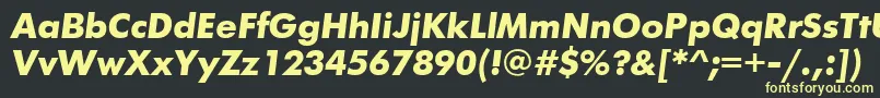 フォントFuturisttBolditalic – 黒い背景に黄色の文字