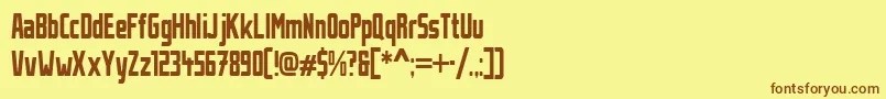 フォントStahlbetontraegerCompressed – 茶色の文字が黄色の背景にあります。