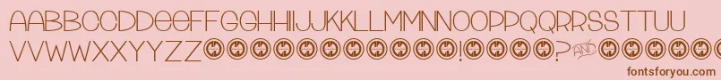 Tattleandtales Font – Brown Fonts on Pink Background