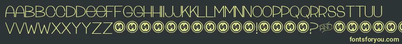 Tattleandtales Font – Yellow Fonts on Black Background