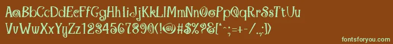 フォントMaracaBold – 緑色の文字が茶色の背景にあります。