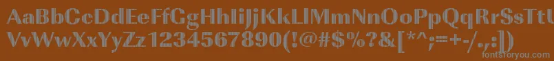 ImperialvjetRegular-fontti – harmaat kirjasimet ruskealla taustalla