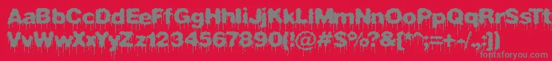 PlasmaDripBrk-Schriftart – Graue Schriften auf rotem Hintergrund