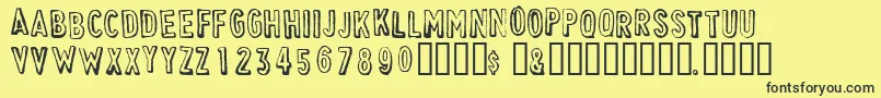 CheapskateOutline Font – Black Fonts on Yellow Background