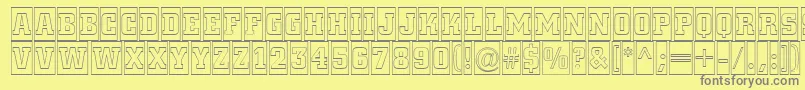 ACitynovattlcmotl-fontti – harmaat kirjasimet keltaisella taustalla