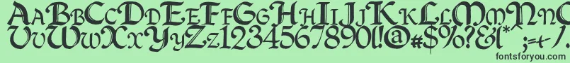 フォントQuillc – 緑の背景に黒い文字