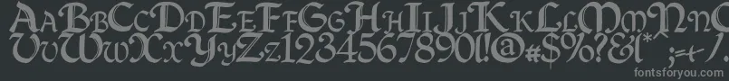 フォントQuillc – 黒い背景に灰色の文字