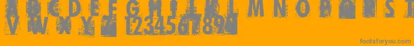 PrintError-Schriftart – Graue Schriften auf orangefarbenem Hintergrund
