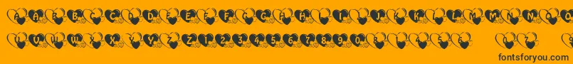 LiebMutterlein Font – Black Fonts on Orange Background