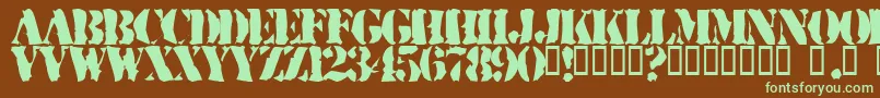 Ruggs Font – Green Fonts on Brown Background