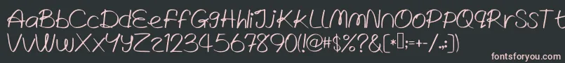 WrittenLies Font – Pink Fonts on Black Background