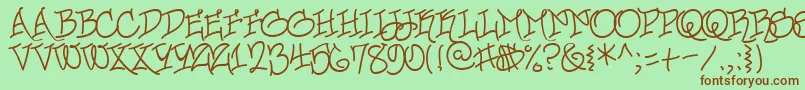 Fonte UrbanScrawlButtah – fontes marrons em um fundo verde