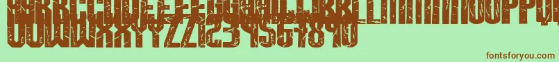 Breaksteel Font – Brown Fonts on Green Background