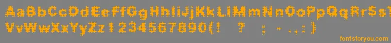 Fdmedian-Schriftart – Orangefarbene Schriften auf grauem Hintergrund