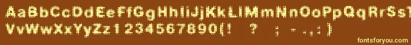 Fdmedian-Schriftart – Gelbe Schriften auf braunem Hintergrund