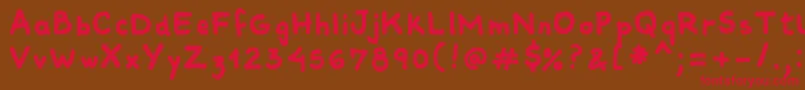 Comiquitasans Font – Red Fonts on Brown Background