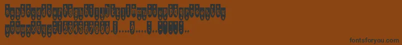 Popde Font – Black Fonts on Brown Background