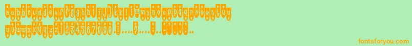 フォントPopde – オレンジの文字が緑の背景にあります。