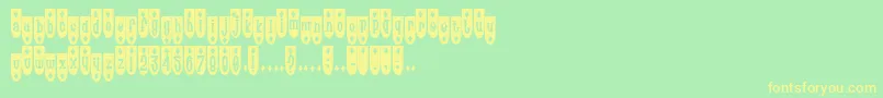 フォントPopde – 黄色の文字が緑の背景にあります