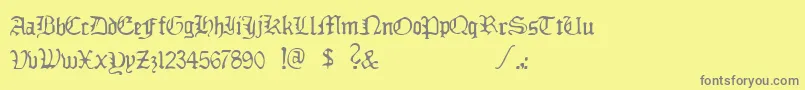 フォントDeadlyBreakfast – 黄色の背景に灰色の文字