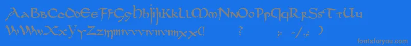 フォントDsuncialfunnyc – 青い背景に灰色の文字