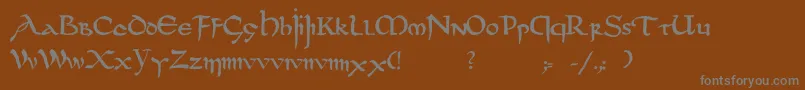 Шрифт Dsuncialfunnyc – серые шрифты на коричневом фоне