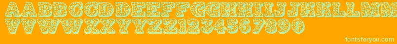Czcionka Jfhollydayz – zielone czcionki na pomarańczowym tle