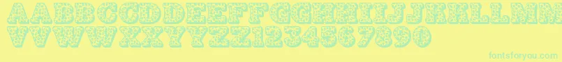 Jfhollydayz-Schriftart – Grüne Schriften auf gelbem Hintergrund