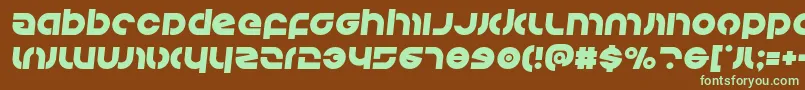 フォントKovacssemital – 緑色の文字が茶色の背景にあります。