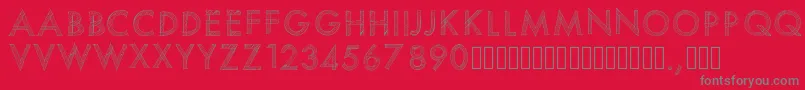 Fonte Pwscratchedfont – fontes cinzas em um fundo vermelho