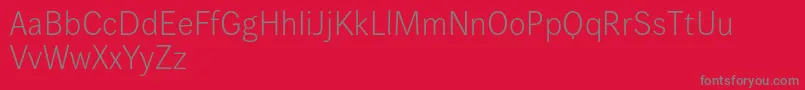 Wendelinreduced45leicht-Schriftart – Graue Schriften auf rotem Hintergrund