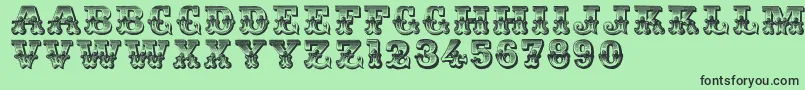 Romantiques-fontti – mustat fontit vihreällä taustalla