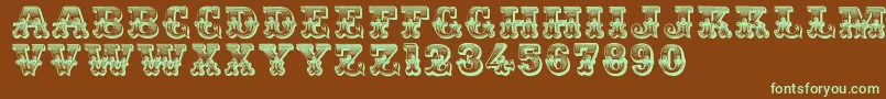 Romantiques-fontti – vihreät fontit ruskealla taustalla