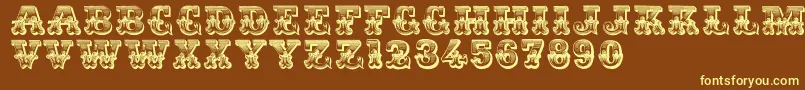 Romantiques-fontti – keltaiset fontit ruskealla taustalla